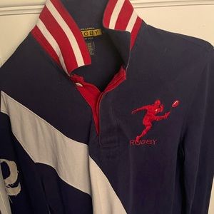 Blue with white stripe and red patch… Men Rugby… Shirt… size XS..